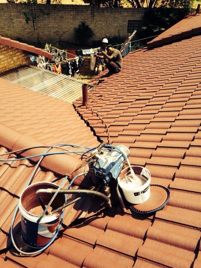 Tiled roof with tools during a repair