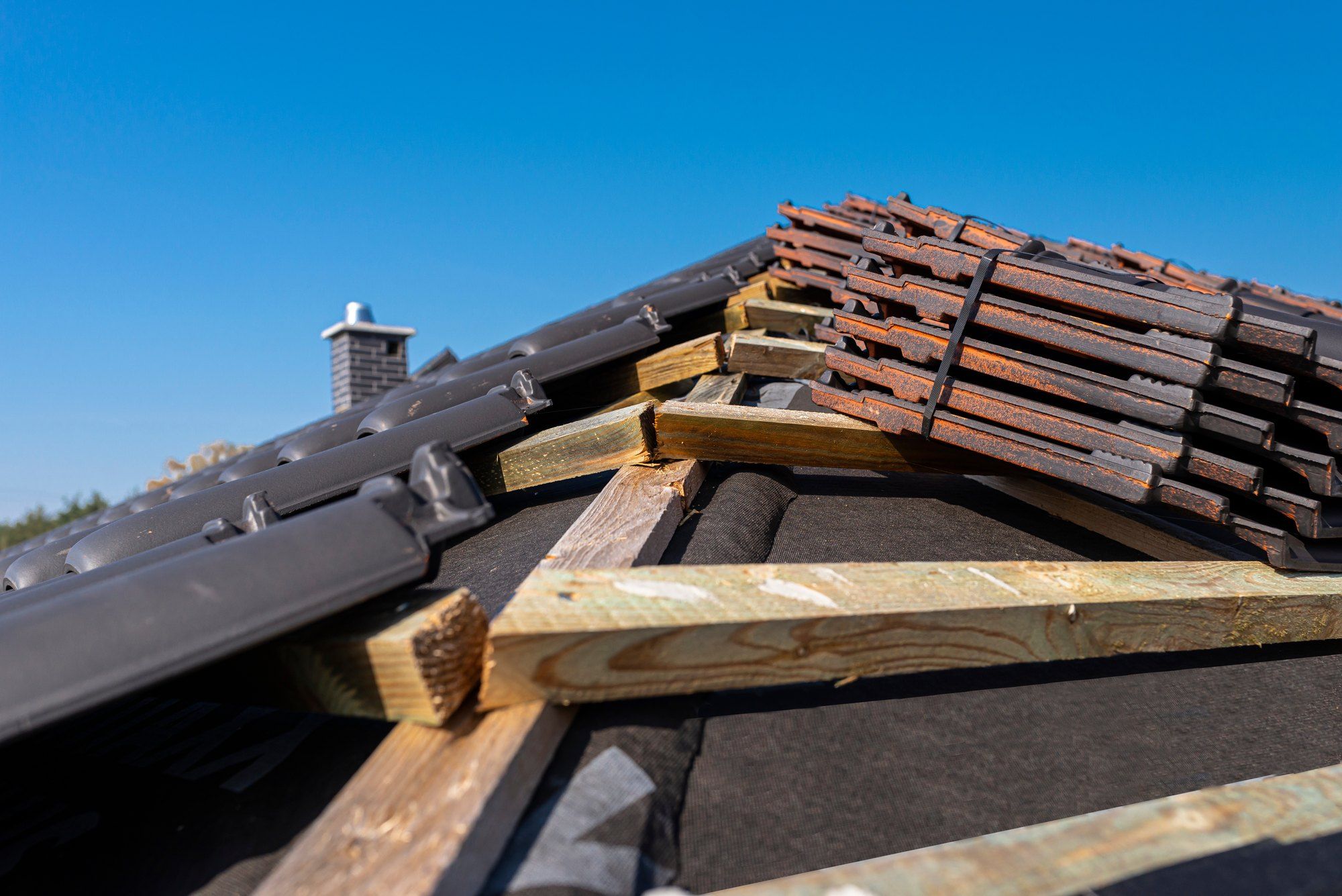 New battens and roof tiles on a pitched roof